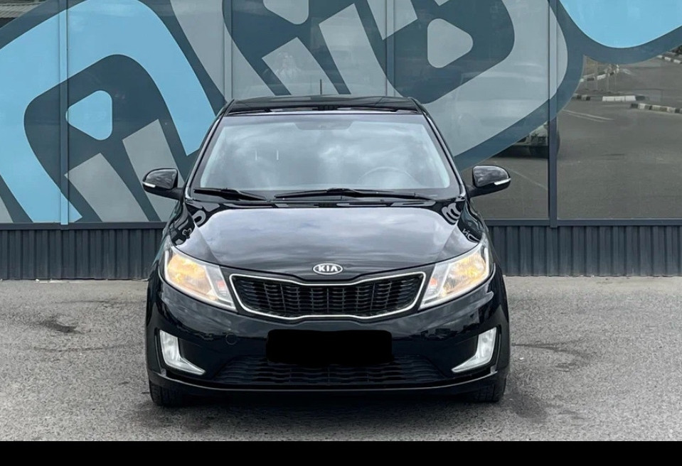 Аренда kia rio эконом класса 2013 года в городе Москва ВДНХ от 1680 руб./сутки, передний привод, двигатель: бензин, объем 1.6 литров, ОСАГО (Мультидрайв), без водителя, недорого, вид 2 - RentRide