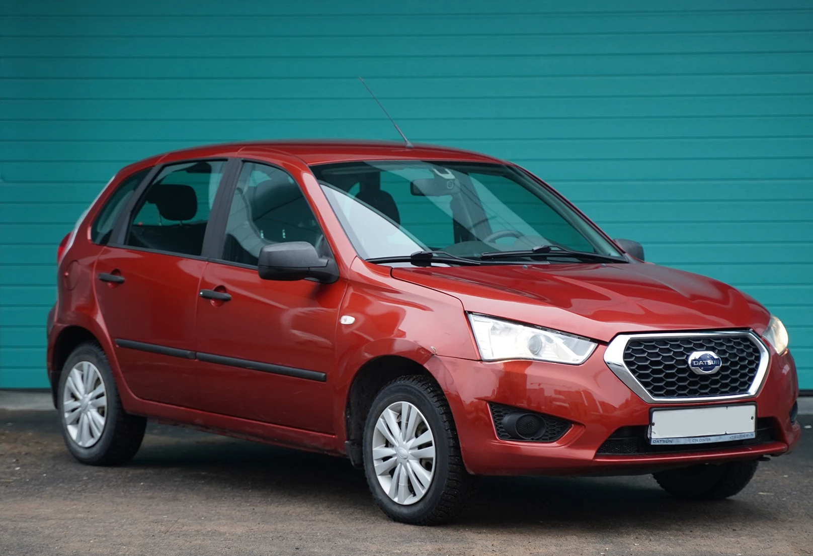 Аренда datsun mi-do эконом класса 2015 года в городе Москва Парнас от 1500 руб./сутки, передний привод, двигатель: бензин, объем 1.6 литров, ОСАГО (Мультидрайв), без водителя, недорого, вид 4 - RentRide