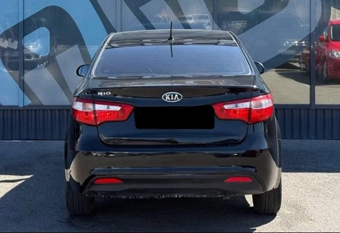 Аренда kia rio эконом класса 2011 года в городе Москва ВДНХ от 1590 руб./сутки, передний привод, двигатель: бензин, объем 1.6 литров, ОСАГО (Мультидрайв), без водителя, недорого, вид 4 - RentRide