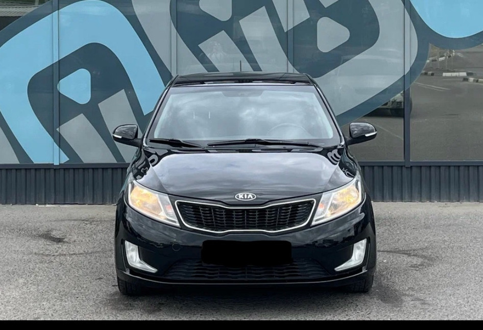 Аренда kia rio эконом класса 2012 года в городе Москва ВДНХ от 1680 руб./сутки, передний привод, двигатель: бензин, объем 1.6 литров, ОСАГО (Мультидрайв), без водителя, недорого, вид 2 - RentRide