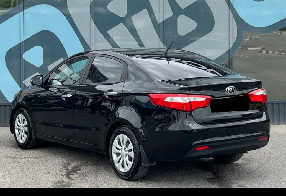 Аренда kia rio эконом класса 2012 года в городе Москва ВДНХ от 1680 руб./сутки, передний привод, двигатель: бензин, объем 1.6 литров, ОСАГО (Мультидрайв), без водителя, недорого, вид 3 - RentRide