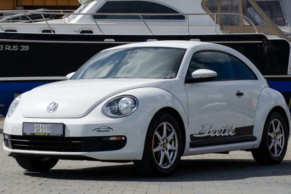 Прокат авто volkswagen beetle стандарт класса 2014 года в городе Калининград от 3992 руб./сутки, передний привод, двигатель: бензин, объем 1.2 литра, каско (Впишу в полис), ОСАГО (Мультидрайв), без водителя, недорого - RentRide