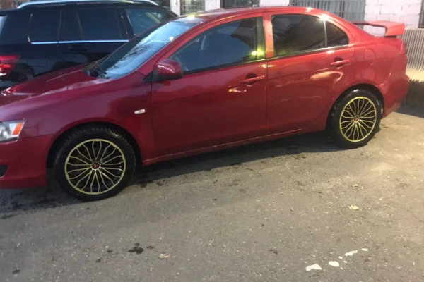 Прокат авто mitsubishi lancer эконом класса 2007 года в городе Москва от 1800 руб./сутки, передний привод, двигатель: бензин, объем 2 литра, ОСАГО (Впишу в полис), без водителя, недорого - RentRide