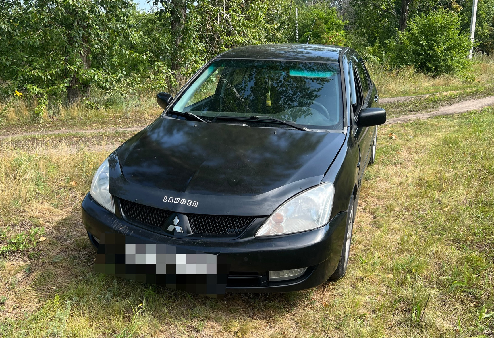 Аренда mitsubishi lancer эконом класса 2006 года в городе Москва от 1600 руб./сутки, передний привод, двигатель: бензин, объем 1.6 литров, ОСАГО (Мультидрайв), без водителя, недорого - RentRide
