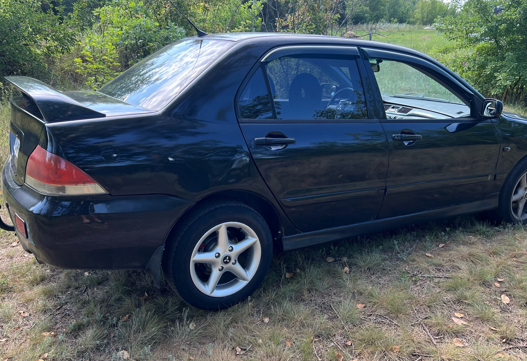Аренда mitsubishi lancer эконом класса 2006 года в городе Москва от 1600 руб./сутки, передний привод, двигатель: бензин, объем 1.6 литров, ОСАГО (Мультидрайв), без водителя, недорого, вид 2 - RentRide
