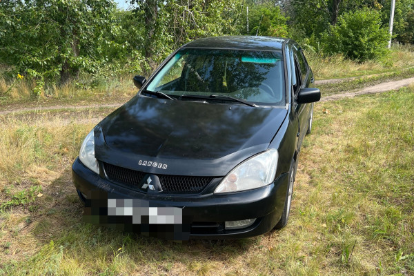 Прокат авто mitsubishi lancer эконом класса 2006 года в городе Воронеж от 1600 руб./сутки, передний привод, двигатель: бензин, объем 1.6 литров, ОСАГО (Мультидрайв), без водителя, недорого - RentRide