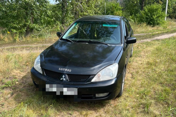 Прокат авто mitsubishi lancer эконом класса 2006 года в городе Воронеж от 1600 руб./сутки, передний привод, двигатель: бензин, объем 1.6 литров, ОСАГО (Мультидрайв), без водителя, недорого - RentRide