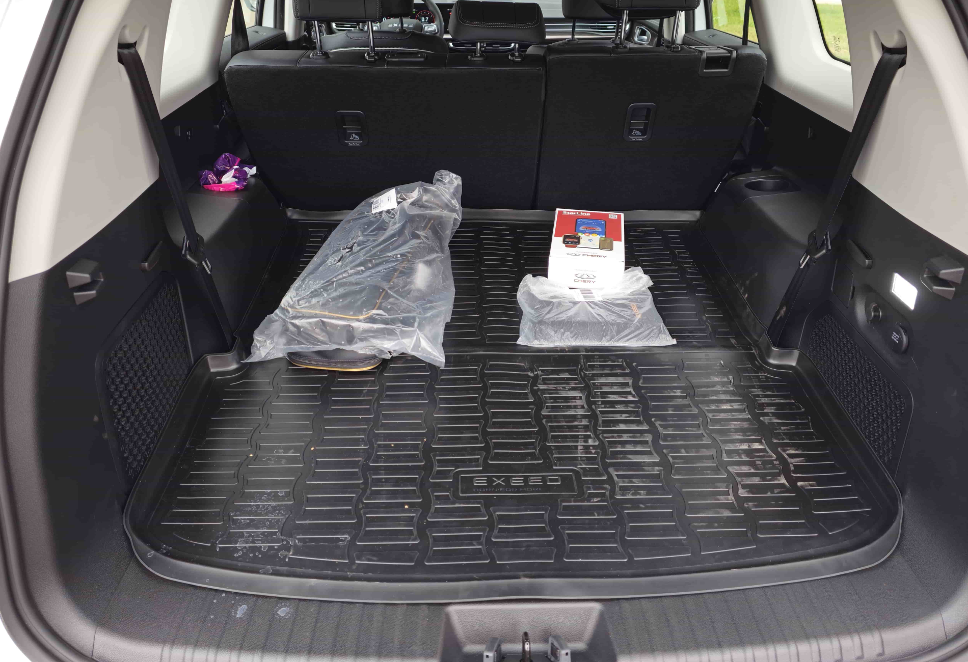 Аренда exeed vx комфорт класса 2023 года в городе Москва Таганская от 6900 руб./сутки, полный привод, двигатель: бензин, объем 2 литра, каско (Мультидрайв), ОСАГО (Мультидрайв), без водителя, недорого, вид 8 - RentRide