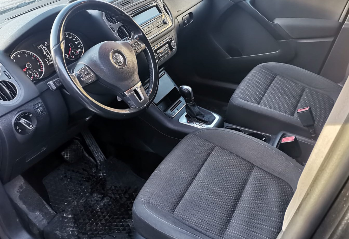 Аренда volkswagen tiguan эконом класса 2013 года в городе Москва Котельники от 2800 руб./сутки, передний привод, двигатель: бензин, объем 1400 литров, ОСАГО (Впишу в полис), без водителя, недорого, вид 5 - RentRide