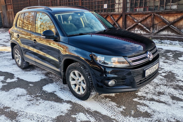 Прокат авто volkswagen tiguan эконом класса 2013 года в городе Москва Котельники от 2800 руб./сутки, передний привод, двигатель: бензин, объем 1400 литров, ОСАГО (Впишу в полис), без водителя, недорого - RentRide