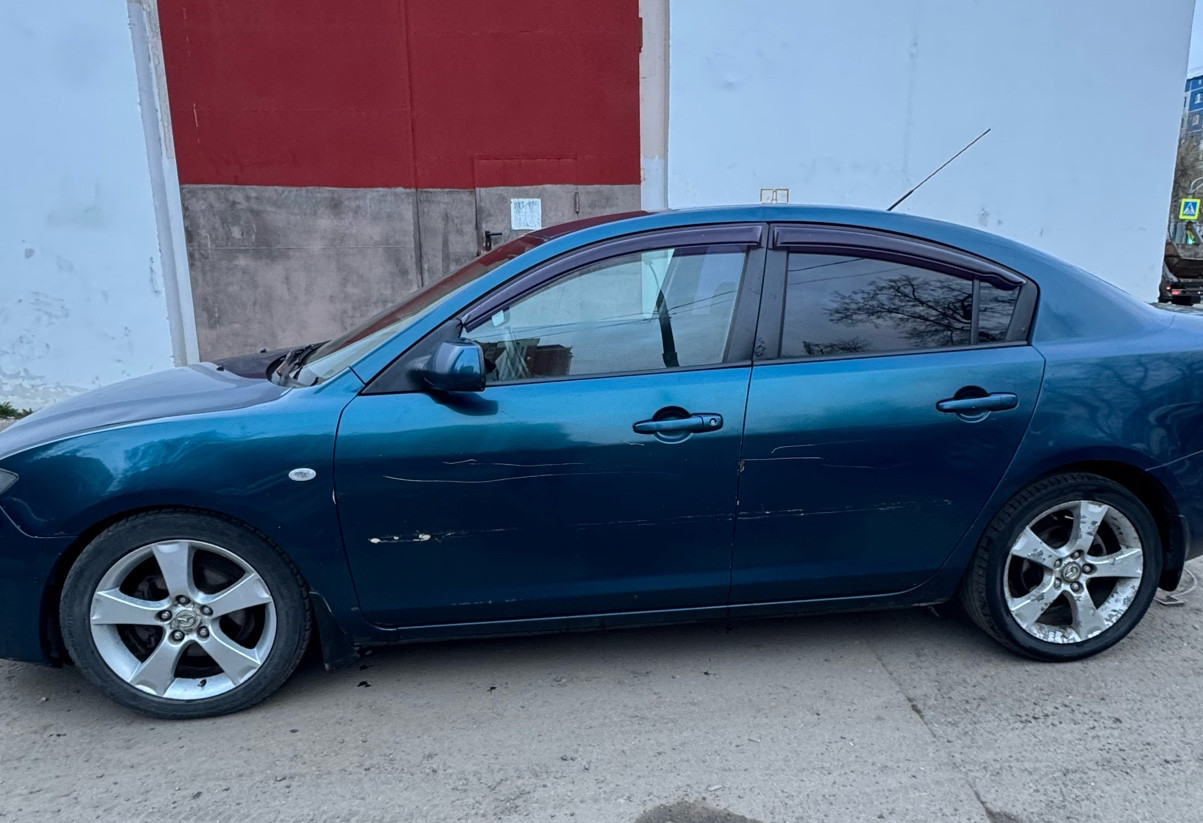 Аренда mazda 3 эконом класса 2007 года в городе Москва Бабушкинская от 1600 руб./сутки, передний привод, двигатель: бензин, объем 1.6 литров, ОСАГО (Впишу в полис), без водителя, недорого - RentRide