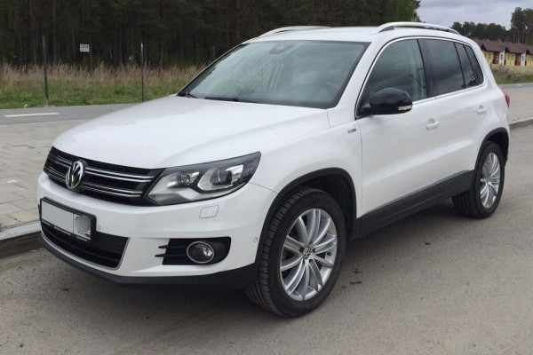 Прокат авто volkswagen tiguan эконом класса 2013 года в городе Москва Таганская от 3400 руб./сутки, полный привод, двигатель: бензин, объем 2 литра, каско (Мультидрайв), ОСАГО (Мультидрайв), без водителя, недорого - RentRide