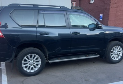 Аренда toyota land-cruiser-prado бизнес класса 2014 года в городе Москва Волгоградский проспект от 4960 руб./сутки, полный привод, двигатель: дизель, объем 3000 литров, ОСАГО (Мультидрайв), без водителя, недорого, вид 4 - RentRide