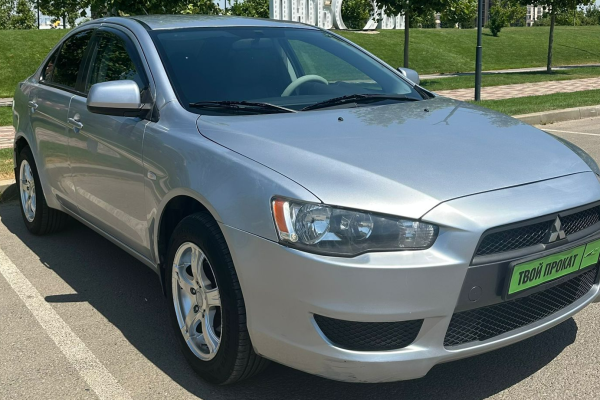 Прокат авто mitsubishi lancer эконом класса 2010 года в городе Краснодар от 2320 руб./сутки, передний привод, двигатель: бензин, объем 1.5 литров, ОСАГО (Мультидрайв), без водителя, недорого - RentRide