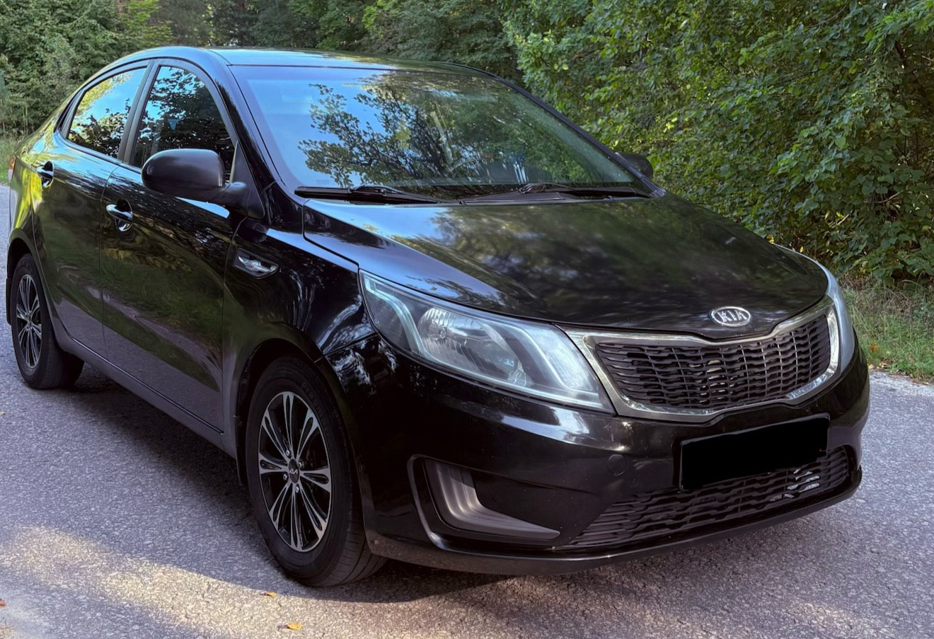 Аренда kia rio эконом класса 2012 года в городе Москва Марксистская от 2160 руб./сутки, передний привод, двигатель: бензин, объем 1.4 литра, ОСАГО (Впишу в полис), без водителя, недорого, вид 2 - RentRide